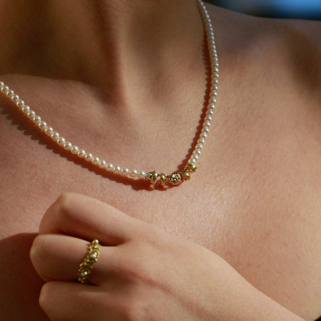 Marilisi artisan fine jewelry White Pearl Yellow Necklace with floral design Mille Fleurs on model