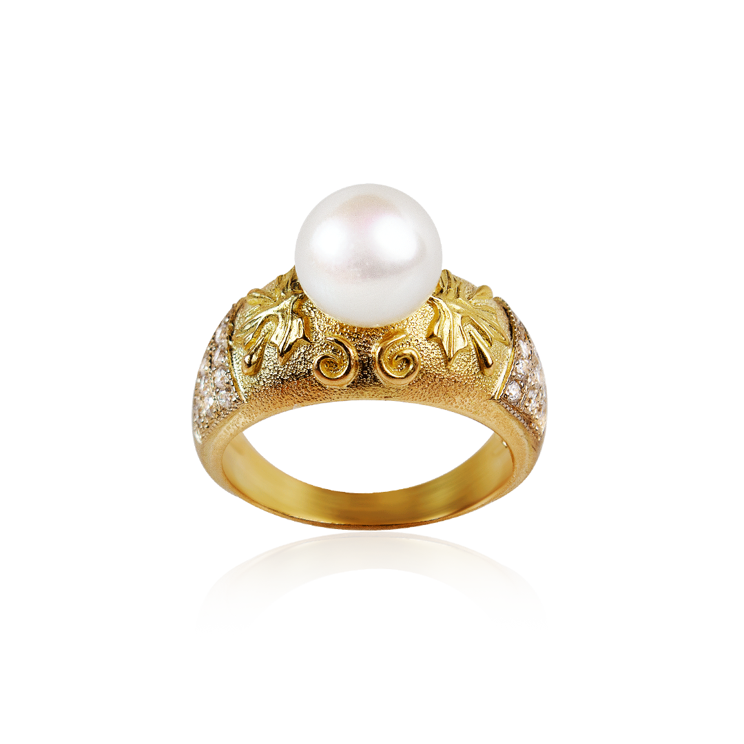Artisan yellow gold ring with luminous white pearl and intricate grapevine design, handcrafted by Marilisi Jewelry House for jewelry connoisseurs and collectors